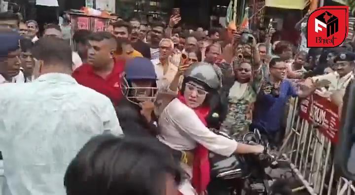 TMC workers are being heckled and assaulted in front of the police.
