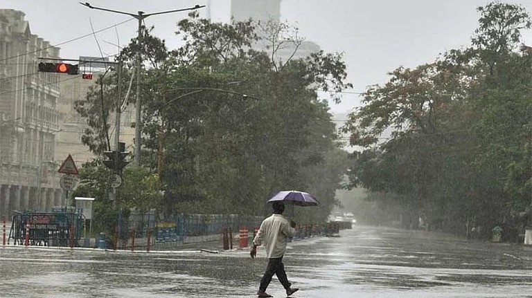 Monsoon arrives in Mumbai; IMD issues yellow alert for heavy rain; chances of drizzle in Delhi as well.