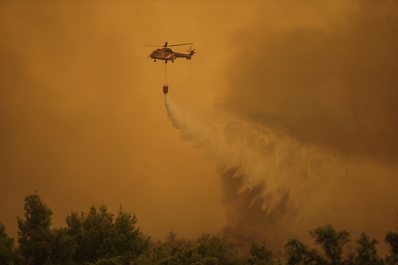 Two firefighting helicopters collide while battling wildfire in Greece